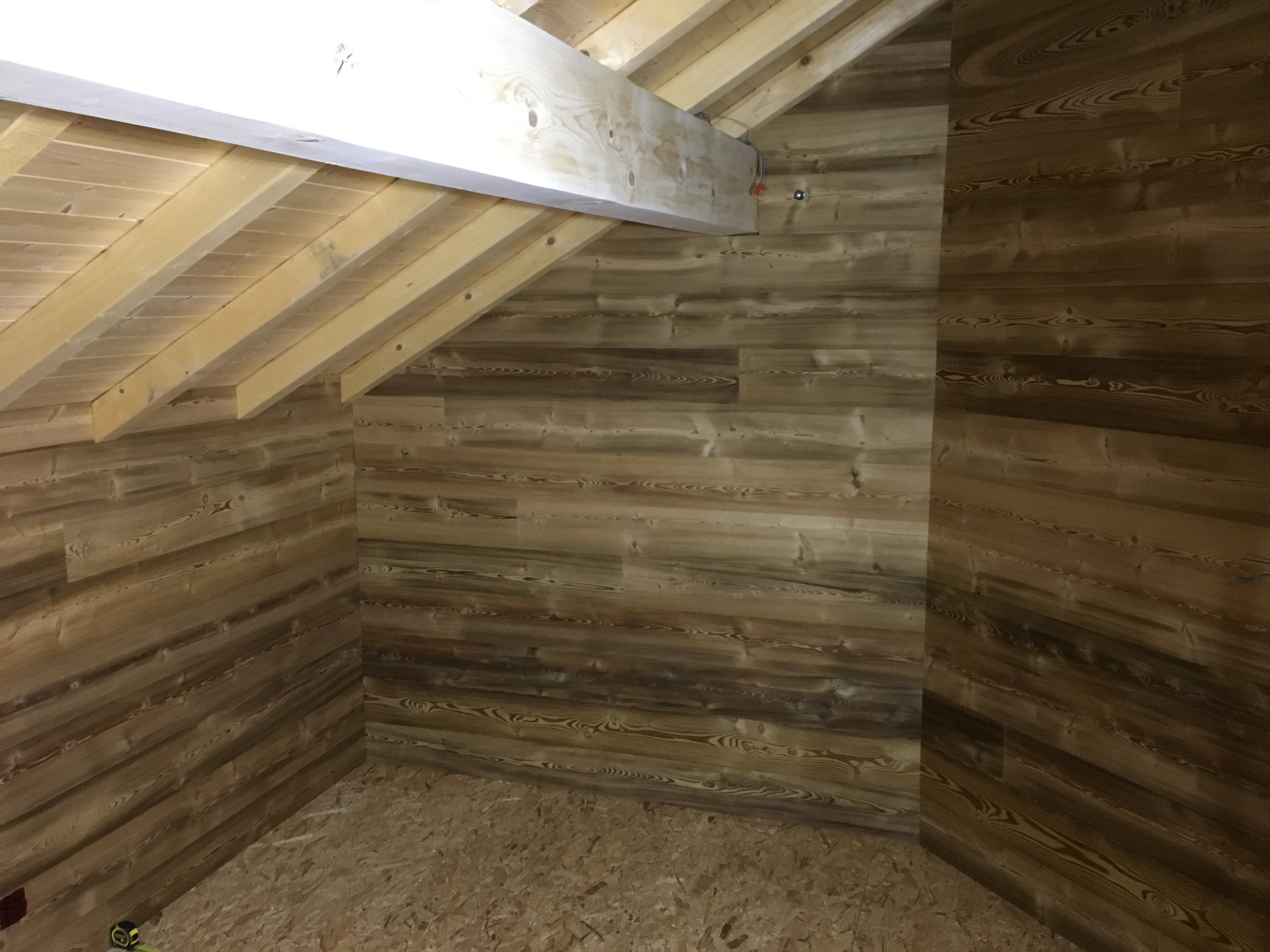 Aménagement d'une chambre sous comble par les artisans Pôle Travaux